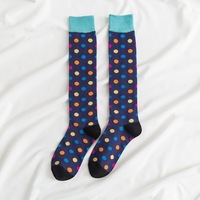 Chaussettes longues chaudes et confortables pour l'hiver, à pois et à motifs de Noël, pour femmes