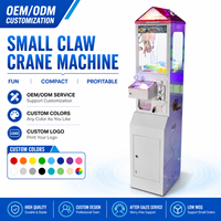 Máquina recreativa de grúa de garras pequeña de metal y plástico Ruike con interfaz en inglés, Mega Mini, operada con monedas, para premios de peluche