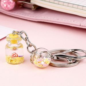 Porte-clés liquide en acrylique avec sable mouvant pour femme, pendentif de sac créatif et mignon pour couple, porte-clés flottant, cadeau - Product Image 5