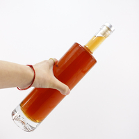 Bouteilles en verre 500ml 750ml 1000ml Bouteilles en verre tequila à fond lourd et rond à épaulement plat
