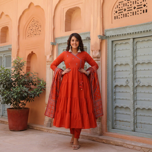 Stylish <b>Womens</b> Orange Cotton Pintex Embroidered Anarkali Set with Tiered <b>Kurta</b> Straight Pants and Floral Printed Dupatta - Product Image 1