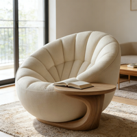 Fauteuils pivotants contemporains ronds et confortables, canapé design unique en forme de pétale avec table d'appoint intégrée, mobilier de réception pour hall d'hôtel
