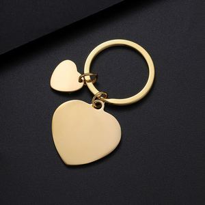 Offre spéciale : porte-clés en acier inoxydable personnalisé en forme de cœur avec petit élément en forme de cœur - Product Image 3