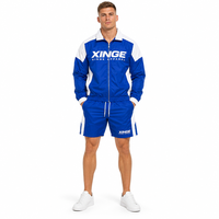Ensemble de survêtement homme à séchage rapide avec logo personnalisé, veste zippée et short, coupe oversize, patchwork irrégulier, style aérodynamique, deux pièces