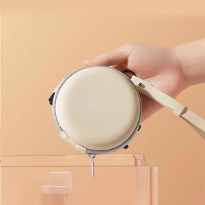 Étui à lunettes rond beige avec fermeture éclair, diamètre 10 cm, sac de rangement portable en cuir EVA pour lunettes, collection Printemps 2025 - Product Image 3