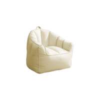 Fauteuil canapé enfant monoplace compressible, multicolore, adapté à plusieurs espaces tels que les salons et les bureaux.
