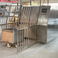 Équipement de nettoyage pour chariots de transformation alimentaire sanitaire : Laveuse automatique à pulvérisation pour chariots à viande et repas préparés pour usines de viande et de plats préparés