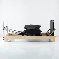 Machine de Pilates Reformer en bois d'érable en gros avec conception de demi-tourneuse semi-élevée pour usage en studio de Pilates
