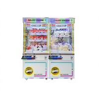 Distributeur de jetons moderne pour machine à griffes avec portique stable à grande vitesse pour salles de jeux d'arcade à fort trafic