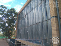 Système de persiennes verticales automatiques rotatives en alliage d'aluminium, personnalisées, finition PVDF, écologiques, pour bâtiments de bureaux contemporains