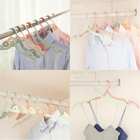 Cintre pliable en plastique extensible pour vêtements de voyage, vente en gros