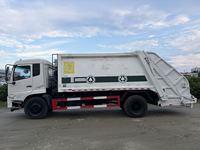 Camion à ordures compacteur d'occasion de 6 mètres cubes, châssis Dongfeng Dolica, Quanchai Euro 6, benne à levage arrière avec télécommande