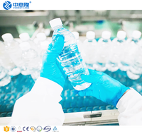 Ligne de production automatique d'eau embouteillée PET de 500ml à 1500ml avec machines d'étiquetage et d'emballage de remplissage par soufflage