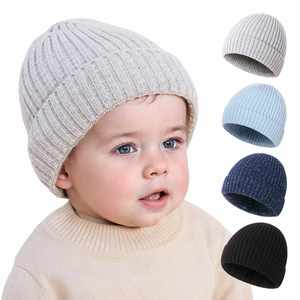 หมวกไหมพรมเด็กแบบนุ่มยืดหยุ่น OEM/ODM ผลิตจากอะคริลิก 100% สีลูกกวาด  สำหรับเด็กผู้ชายและเด็กผู้หญิง เหมาะสำหรับใส่เดินทางและให้ความอบอุ่น - Product Image 2