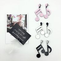 Boucles d'oreilles pendantes asymétriques en acrylique, motif note de musique tendance, vente en gros transfrontalière