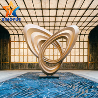 Sculpture abstraite moderne en acier inoxydable poli, peinte en or, avec placage antique, personnalisable, pour la décoration de hall d'hôtel