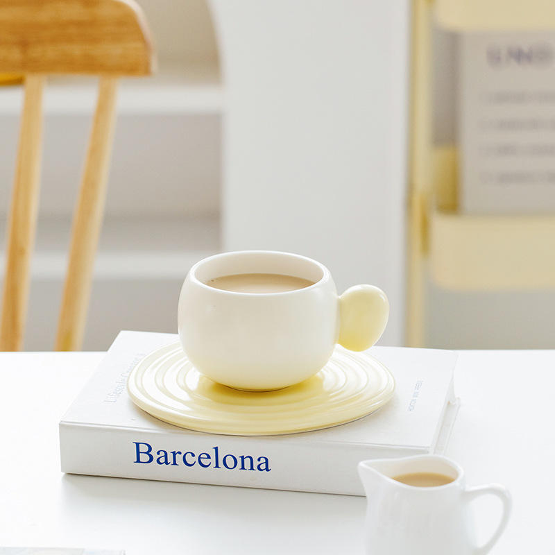 Matte yellow milk ring coffee cup and saucer