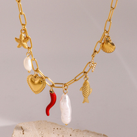Collier pendentif personnalisé en acier inoxydable plaqué or 18 carats avec breloque étoile de mer martelée et perle d'eau douce en forme de cœur