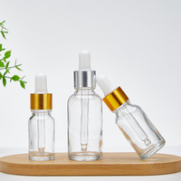 Bouteilles d'huile essentielle en verre transparent/ambre/noir/rose de 5 ml, 10 ml, 20 ml, 30 ml, 50 ml, 100 ml avec compte-gouttes doré/argenté/noir/blanc