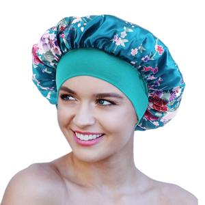 หมวกคลุมผมซาตินสำหรับผู้หญิงผมหยิกขนาดใหญ่พิมพ์ลายสไตล์แอฟริกัน - Product Image 1