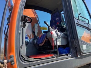 Excavatrice sur pneus Doosan DX210W-9C d'occasion haute performance avec peu d'heures de fonctionnement - Product Image 4