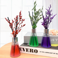 Diffuseur d'huile essentielle naturelle de parfum de parfum de décor à la maison de luxe dans le diffuseur de roseau de bouteille en verre avec le bâton de fleur d'arome