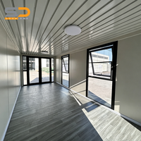 Conteneur mobile auto-pliant de 20 pieds, maison préfabriquée portable, deux chambres, un salon, maison pliable préfabriquée avec remorque
