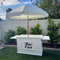 LEDA Nouveau design Chariot à dessert en acrylique blanc Chariot alimentaire mobile avec roues Parasol géant pour la décoration de mariage