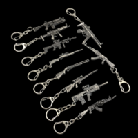 Fabricant en gros de mini porte-clés en métal en forme de pistolet, porte-clés en métal personnalisé en forme de pistolet