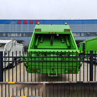 Camion compacteur de déchets Sinotruk HOWO 6x4 à transmission manuelle, moteur diesel, chargement arrière, pour l'assainissement municipal