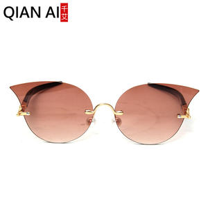 Lunettes de soleil œil de chat Qianai pour femme, verres jaunes océan, protection UV 100%, design irrégulier tendance pour la protection solaire et les voyages - Product Image 5