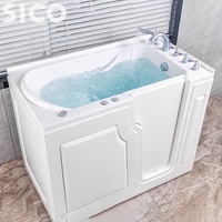 Baignoire autoportante en acrylique pour personnes âgées avec accès sécurisé, porte à basse hauteur et barres d'appui pour usage hôtelier