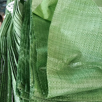China produceert recyclebare groene PP geweven zakken van polypropyleen, leeg, 50KG 100kg, voor bouwafval, afval, zand, 55*95cm