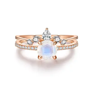 Nuovo arrivo elegante gioielli in oro rosa placcato a forma rotonda pietra di luna con CZ Vice Rings fidanzamento donne anello nuziale Set
