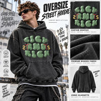 Sweat-shirt à capuche surdimensionné vintage délavé avec impression graphique 3D en relief et poche kangourou