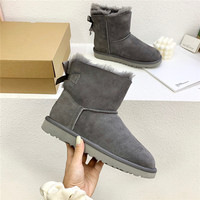 Mode peau de mouton fourrure doublure hiver chaud bottes mi-mollet en cuir court mode arc botte de neige pour femme