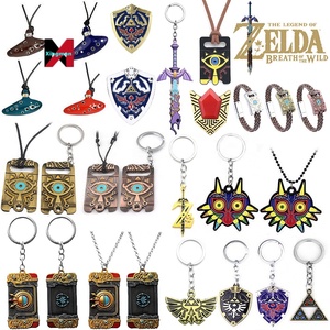 Accessoires de <span class=keywords><strong>jeu</strong></span> Légende <span class=keywords><strong>Zelda</strong></span> Collier de cornemuse Sky Sword Owl <span class=keywords><strong>Breath</strong></span> <span class=keywords><strong>Of</strong></span> <span class=keywords><strong>The</strong></span> <span class=keywords><strong>Wild</strong></span> Eyes Porte-clés porte-clés en métal - Product Image 1