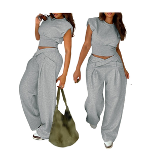 ชุดเซ็ต 2 ชิ้น เสื้อครอปแขนสั้นสีพื้นทรงเข้ารูปและกางเกงขายาวสำหรับผู้หญิงสไตล์ลำลองแฟชั่น - Product Image 1