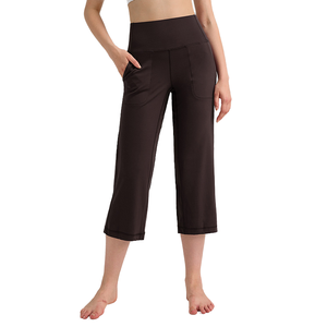 Leggings de yoga personnalisés pour femmes, sportifs et décontractés, coupe large, taille haute, effet push-up, courts, finition sablée, respirants, extensibles dans les quatre sens, vente en gros - Product Image 1