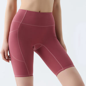 Vente en gros de shorts d'entraînement pour femmes avec poches latérales shorts de yoga décontractés à taille haute - Product Image 1
