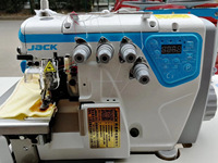 Machine à surjet Jack C3 automatique à grande vitesse à 3 fils d'occasion machine à coudre industrielle à point noué informatisé pour chemises
