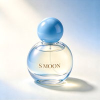 Nouvelle conception, flacon de parfum en verre mignon de 50 ml et 100 ml avec bouchon à bille coloré et boîte, flacon en verre vide personnalisé de 30 ml et 75 ml pour parfum