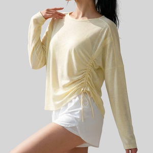 เสื้อโยคะแขนยาวรัดเอวสำหรับผู้หญิง สีนู้ด เนื้อผ้ายืดหยุ่นสูง เสื้อออกกำลังกายกระชับสัดส่วน เสื้อยืดคลุมออกกำลังกาย - Product Image 1