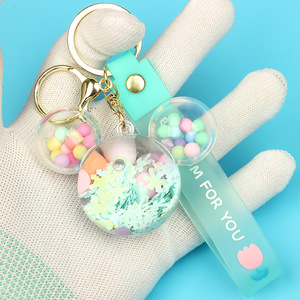 Vente en gros de perle d'huile tête de <span class=keywords><strong>Mickey</strong></span> coulant sable porte-clés pendentif boucle personnalisé livre sac acrylique poupée pendentif - Product Image 3