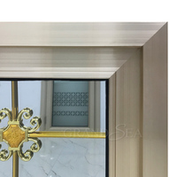Fenêtre en aluminium à double vitrage trempé avec cadre champagne et motif grille florale