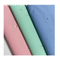 Fournisseur de tissus 30D T800 Taffetas tissé coupe-vent imperméable et résistant à l'eau 100% polyester pour vestes et vêtements de neige pour garçons et filles