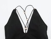 Combinaison chic sans manches pour femme, nouvelle collection 2026, style décontracté, col en V, ornée d'œillets, tendance rétro.