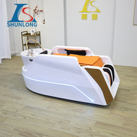 Fauteuil de lavage de cheveux moderne avec massage électrique et circulation d'eau pour soins capillaires