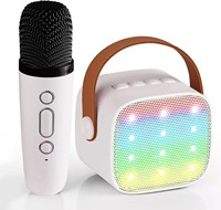 Mini haut-parleur karaoké LED portable le plus vendu avec 2 micros sans fil. Idéal pour le divertissement des enfants, caractéristiques son HiFi
