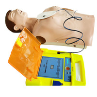 Simulateur de formation en défibrillation externe automatique et en RCR, combinaison de simulateur de défibrillateur AED et de simulateur de réanimation cardio-pulmonaire